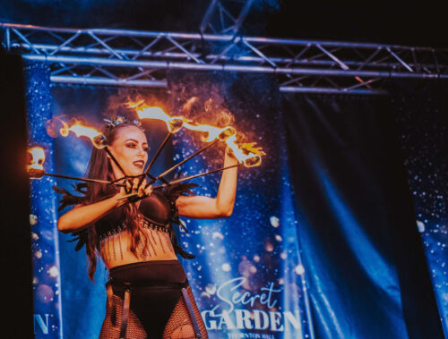 Live Fire Entertainment at SCREAMS! at Thornton Hall Country Park Fire performer entertaining guests with flaming torches at SCREAMS! at Thornton Hall Country Park Halloween event.